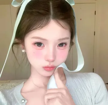 梁女士
